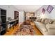 Cozy living room with hardwood floors, area rug, and furniture at 2657 Lenox Ne Rd # C38, Atlanta, GA 30324