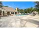 Outdoor community pool with lounge chairs and a covered building with seating at 2657 Lenox Ne Rd # C38, Atlanta, GA 30324
