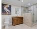 Bathroom features a granite vanity, travertine walls, and a glass-enclosed shower at 3850 Pilgrim Mill Rd, Cumming, GA 30041