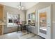 Bright breakfast nook with views of the backyard and access to the outdoor porch at 3850 Pilgrim Mill Rd, Cumming, GA 30041