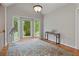 Bright foyer with hardwood floors, bay windows, and a view of the front yard at 3850 Pilgrim Mill Rd, Cumming, GA 30041