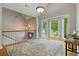 Bright foyer with hardwood floors and a view of the front yard at 3850 Pilgrim Mill Rd, Cumming, GA 30041