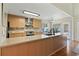 Modern kitchen featuring stainless steel appliances, custom wood cabinets, and a spacious island at 3850 Pilgrim Mill Rd, Cumming, GA 30041