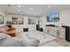 Spacious living room features recessed lighting, large windows, and a decorative area rug at 3850 Pilgrim Mill Rd, Cumming, GA 30041