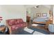 View of the primary bedroom highlights its vaulted ceiling, hardwood floors, and sitting area at 3850 Pilgrim Mill Rd, Cumming, GA 30041
