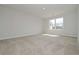 Spacious bedroom filled with natural light and neutral carpet at 500 Charleston Pl, Villa Rica, GA 30180