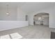 Bright living room open to the kitchen, offering a modern and airy feel at 500 Charleston Pl, Villa Rica, GA 30180