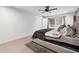Spacious bedroom with light hardwood floors and a large bed at 650 Hunterhill Ct, Roswell, GA 30075