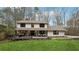 Charming two-story home with a large front yard and inviting deck, perfect for outdoor gatherings at 650 Hunterhill Ct, Roswell, GA 30075