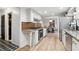 Well-appointed kitchen with stainless steel appliances, granite countertops, and a seamless connection to the dining area at 650 Hunterhill Ct, Roswell, GA 30075