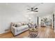 Spacious living room filled with natural light and open view of the kitchen at 650 Hunterhill Ct, Roswell, GA 30075