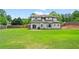 Large, level backyard with a patio, ideal for entertaining and outdoor activities at 1923 Hamby Place Nw Dr, Acworth, GA 30102