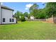 Expansive backyard featuring lush green grass and a privacy fence, perfect for outdoor enjoyment at 1923 Hamby Place Nw Dr, Acworth, GA 30102