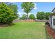Lush, green backyard with mature trees, offering a private and peaceful outdoor retreat at 1923 Hamby Place Nw Dr, Acworth, GA 30102