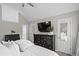 Bedroom featuring a ceiling fan, large dresser and access to the bathroom at 1923 Hamby Place Nw Dr, Acworth, GA 30102