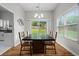 Cozy dining room with hardwood floors, lots of light, and a view of the backyard at 1923 Hamby Place Nw Dr, Acworth, GA 30102