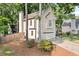 Two-story traditional home boasts an attached garage, mature trees and a cozy setting nestled in a quiet neighborhood at 3376 Hickory Ln, Powder Springs, GA 30127