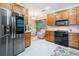 Modern kitchen featuring stainless steel appliances and ample counter space at 3376 Hickory Ln, Powder Springs, GA 30127