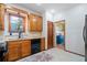 Well-equipped kitchen features wood cabinets, granite countertops, and modern appliances at 3376 Hickory Ln, Powder Springs, GA 30127