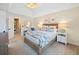 Comfortable main bedroom with a king bed, plush carpet, and ensuite access at 3376 Hickory Ln, Powder Springs, GA 30127