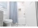 Bathroom with tiled shower/tub, unique floor and white fixtures at 398 Nw Wester Blvd, Atlanta, GA 30314
