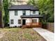 Charming two-story home with a welcoming front porch and a well-maintained yard at 398 Nw Wester Blvd, Atlanta, GA 30314