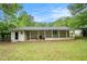 View of the home's backyard with a covered patio at 4004 Knightsbridge Nw Rd, Kennesaw, GA 30144