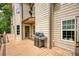 Back deck featuring a grill, access to the home, and natural light at 547 Ellington Rd, Oxford, GA 30054