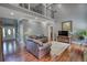 Inviting living room featuring hardwood floors, and an abundance of natural light at 547 Ellington Rd, Oxford, GA 30054
