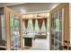 Charming screened porch featuring natural light and comfortable seating at 547 Ellington Rd, Oxford, GA 30054