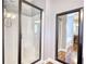 Modern shower with glass enclosure and sleek fixtures, reflecting a view of the bathroom at 547 Ellington Rd, Oxford, GA 30054