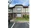 Inviting townhome with a well-maintained lawn and a charming brick facade at 1805 Ashborough Se Cir # D, Marietta, GA 30067