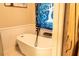 Bright bathroom showcasing a freestanding tub and decorative wall art at 4076 Airline, Mcdonough, GA 30252