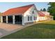 Spacious two-car garage with an open gym area and ample natural light at 4076 Airline, Mcdonough, GA 30252