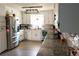 Bright kitchen featuring stainless steel appliances, white cabinets, and stylish countertops for modern living at 4076 Airline, Mcdonough, GA 30252