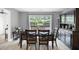 Dining room includes hardwood-style floors, a buffet, and a patio view at 4468 Whitt Station Nw Run, Acworth, GA 30101
