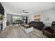 The dining and living area is full of natural light and includes stylish furnishings at 4468 Whitt Station Nw Run, Acworth, GA 30101