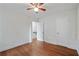 Bedroom featuring hardwood floors, ceiling fan, ample lighting and white trim at 472 Rigby Ne St, Marietta, GA 30060