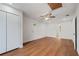 Bedroom featuring hardwood floors, a ceiling fan, ample lighting and white trim at 472 Rigby Ne St, Marietta, GA 30060