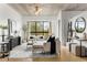 Bright living room with large windows, contemporary furnishings, and wood flooring at 563 Memorial Dr # 211, Atlanta, GA 30312