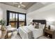 Bedroom with a private balcony, upholstered headboard and well appointed decor at 563 Memorial Dr # 211, Atlanta, GA 30312