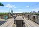 Expansive rooftop deck with outdoor dining area and city views at 563 Memorial Dr # 211, Atlanta, GA 30312