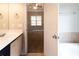 Bathroom with single vanity adjacent to bedroom at 6416 Vicksburg Nw Ct, Acworth, GA 30101