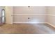 Empty bedroom with neutral carpet and a white door at 6416 Vicksburg Nw Ct, Acworth, GA 30101