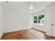 Bedroom with hardwood flooring and window overlooking the yard at 1221 Oakfield Se Dr, Atlanta, GA 30316