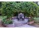 Enchanting vine-covered patio with stone floor, perfect for outdoor dining and entertaining at 1221 Oakfield Se Dr, Atlanta, GA 30316