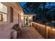 Charming covered porch with stone flooring, updated exterior lighting, and comfortable seating at 1221 Oakfield Se Dr, Atlanta, GA 30316