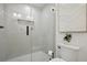Elegant glass shower with tiled walls and matte black fixtures at 1221 Oakfield Se Dr, Atlanta, GA 30316