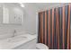 Bathroom featuring a vanity with modern faucet and a shower with a patterned curtain at 3341 Cranmore Chase, Marietta, GA 30066
