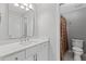 Bright bathroom with a stylish vanity, contemporary mirror, and walk-in shower at 3341 Cranmore Chase, Marietta, GA 30066